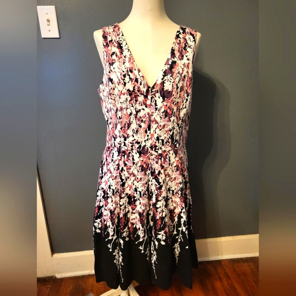Sleeveless floral dress size 14m.